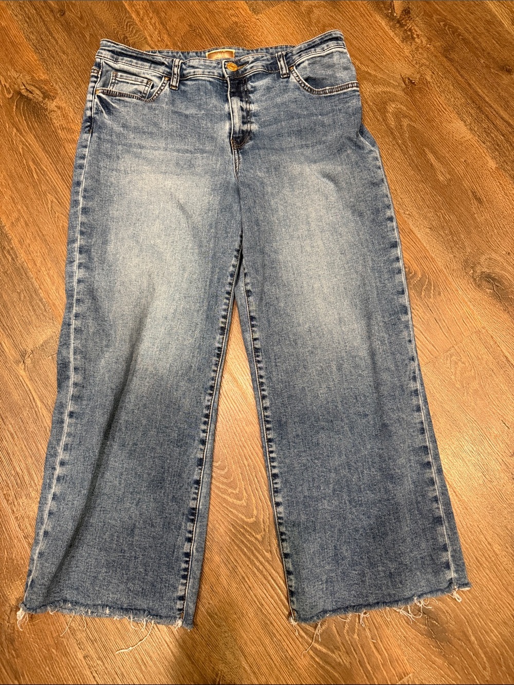 Kut from the Kloth Charlotte Wide-Leg Jeans in Faded Blue Wash with raw hem